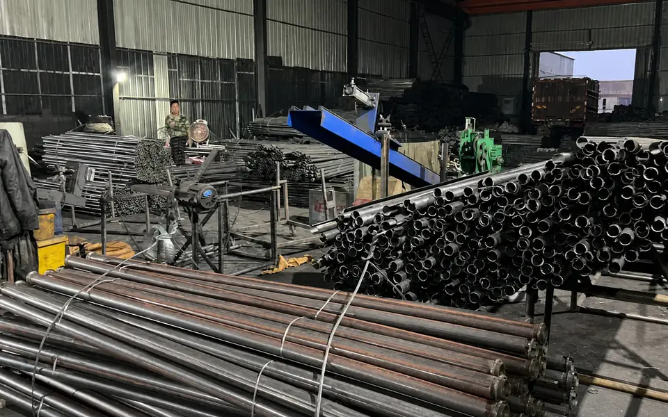 Steel tube bundles and work-in-process materials inside the Xianhong Mining workshop